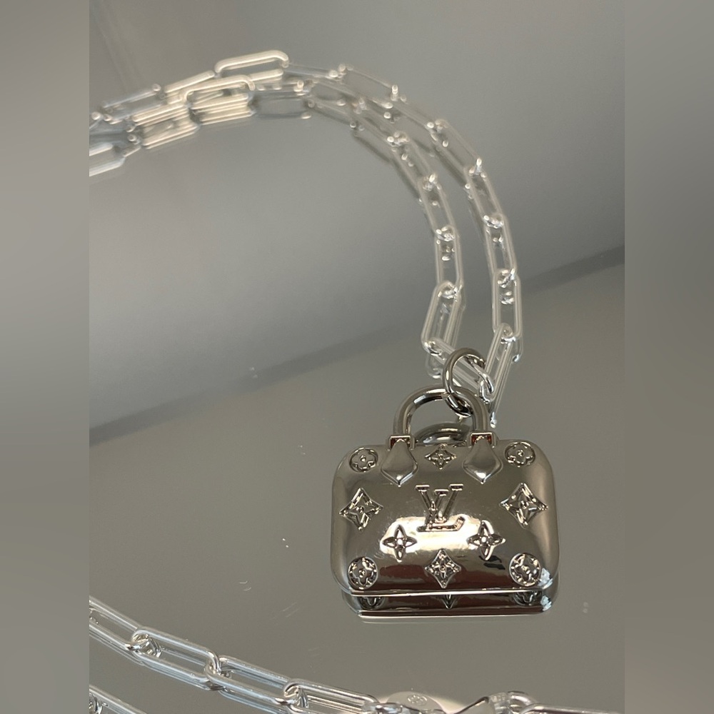 AUTHENTIC Louis Vuitton Silver Bag Charm strong on Sterling silver